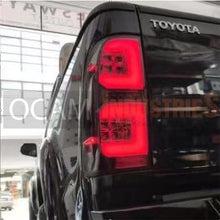 Load image into Gallery viewer, LED Tail Lights Upgrade For Toyota Hilux N70, 2005-15 LH &amp; RH Side in Black
